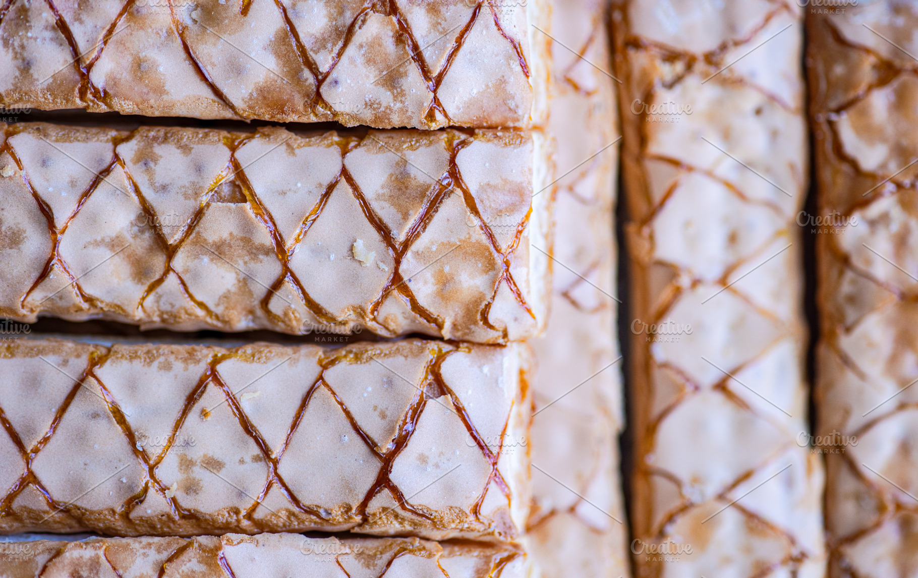 Textured fresh baked puff pastry, a Food & Drink Photo by Anna Bogush