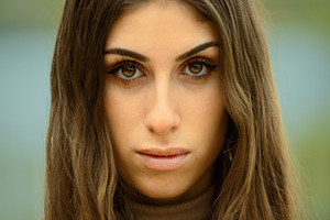 Intense female portrait with a direc, a Person Photo by Perpis