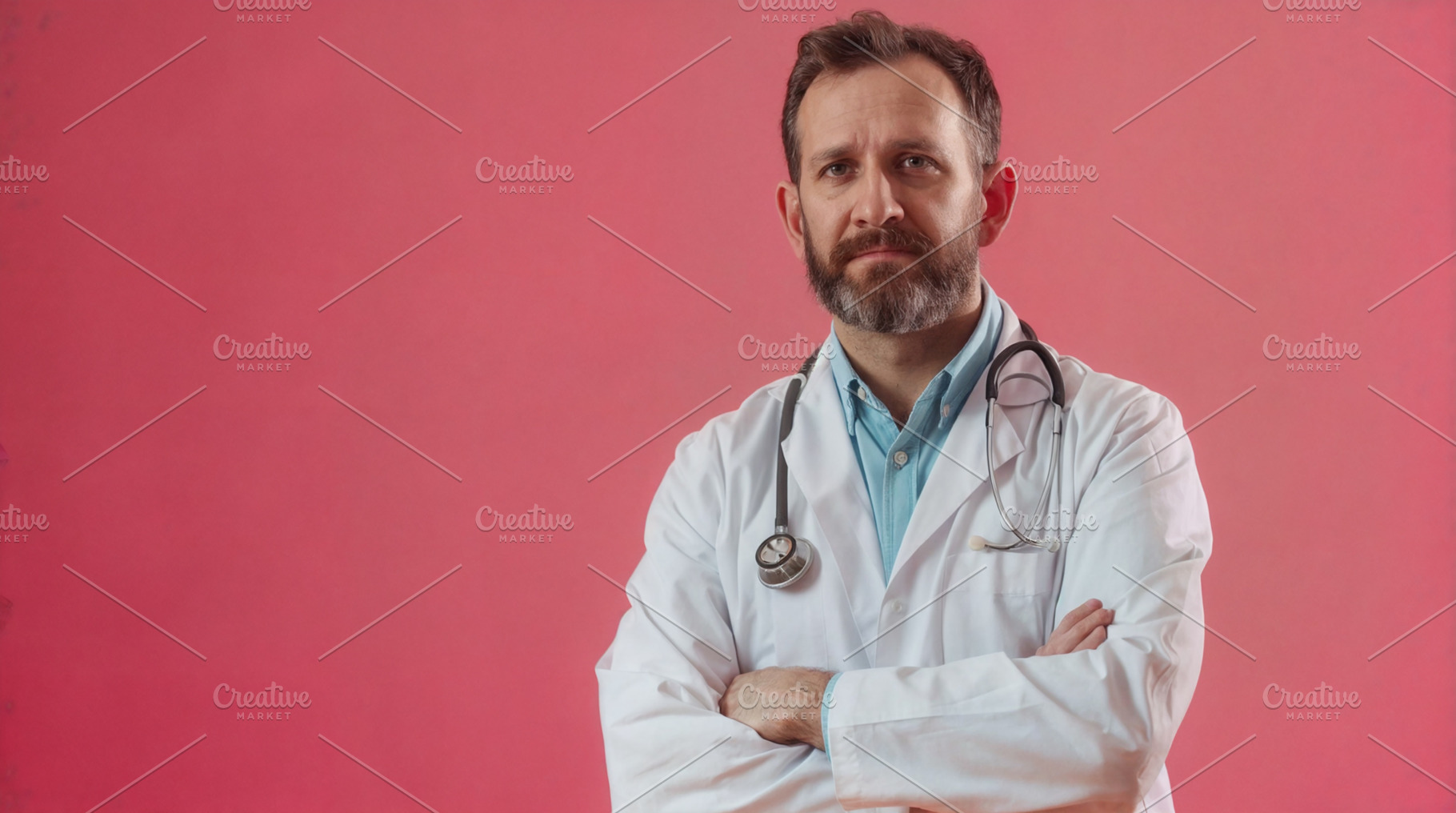 Male doctor in a medical gown, a Health & Medical Photo by Handmadefont