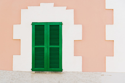 Pink house facade with green shutter, an Architecture Photo by PixaSquare