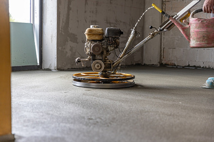 Polishing sand and cement screed floor, a Photo by Grafvision photography
