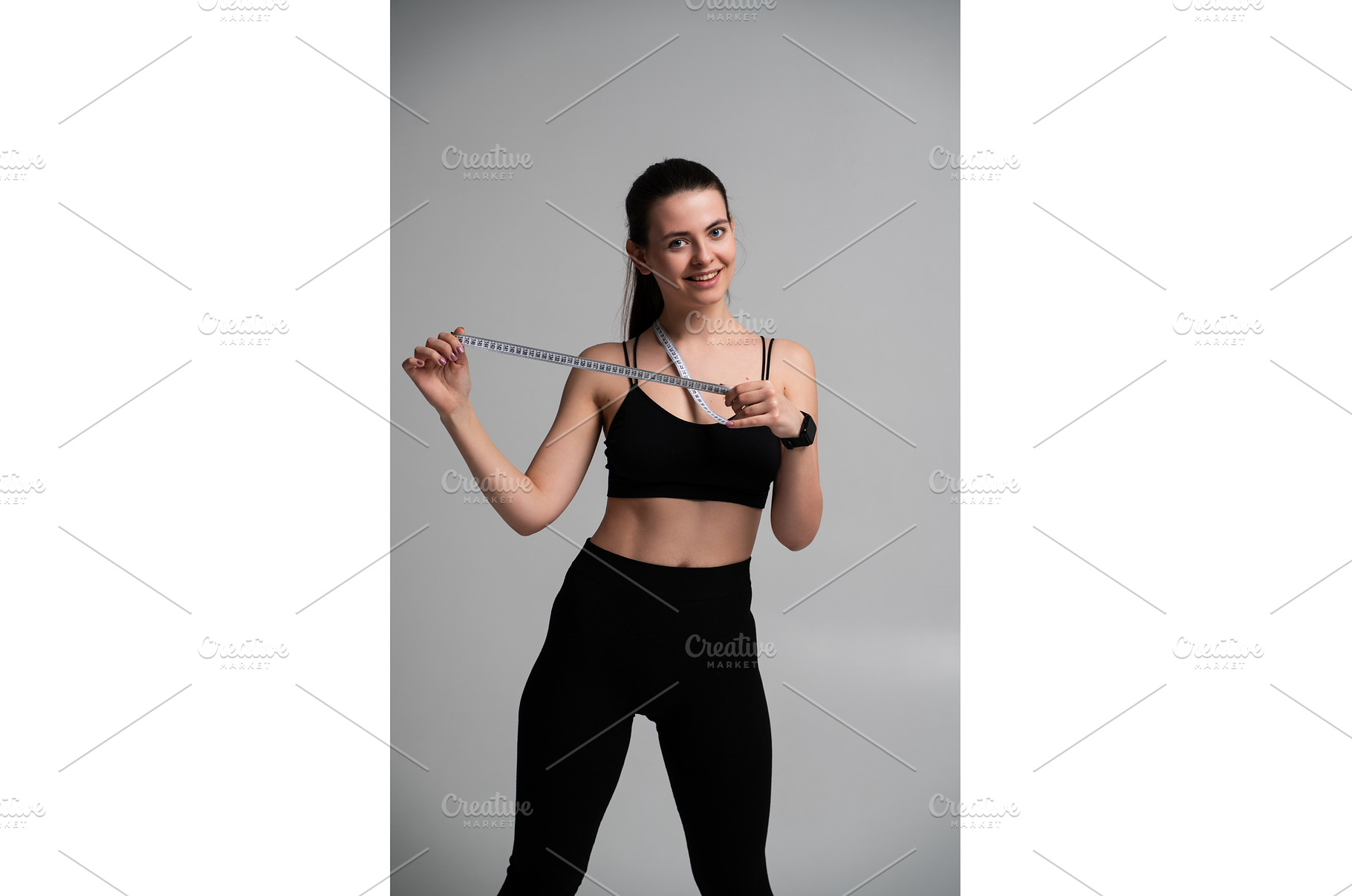 Young woman smiling, wearing black, a Sports & Recreation Photo by volodymyrshtun13795