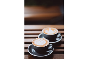 Two cups of cappuccino, a Food & Drink Photo by Anna Efetova