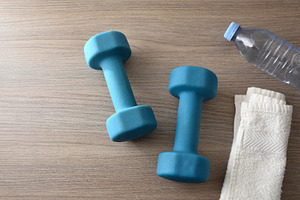 Blue Dumbbells, Water Bottle and Towel on Wooden Surface, a Sports & Recreation Photo by Davizro's Market