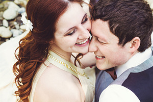 Wedding day featuring couple, touch, and groom