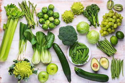 Healthy eating green vegetables featuring top view, vegan concept, and