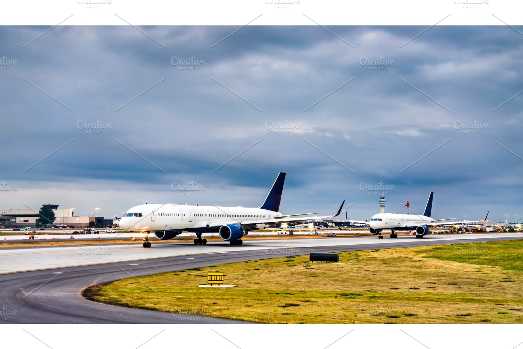 Airplanes lined up for takeoff at stock photo containing airplane and travel, a Transportation Photo by Leonid Andronov