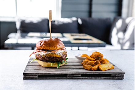 Delicious burger with potatoes and, a Food & Drink Photo by Daniel Megias