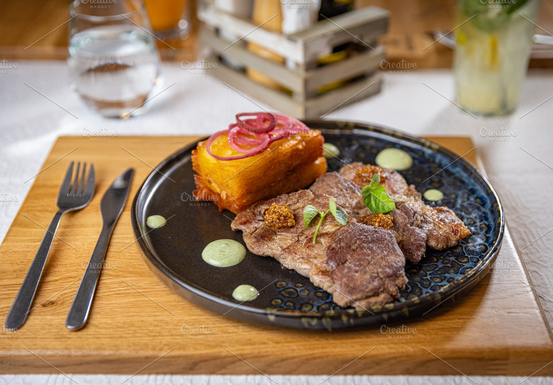 Delicious grilled pork with potato gratin, a Photo by Grafvision photography