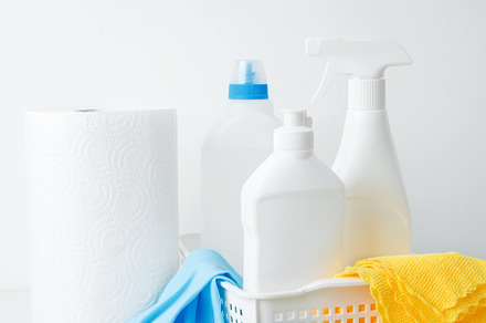 Cleaning supplies in a container, ready for a productive and satisfying spring
