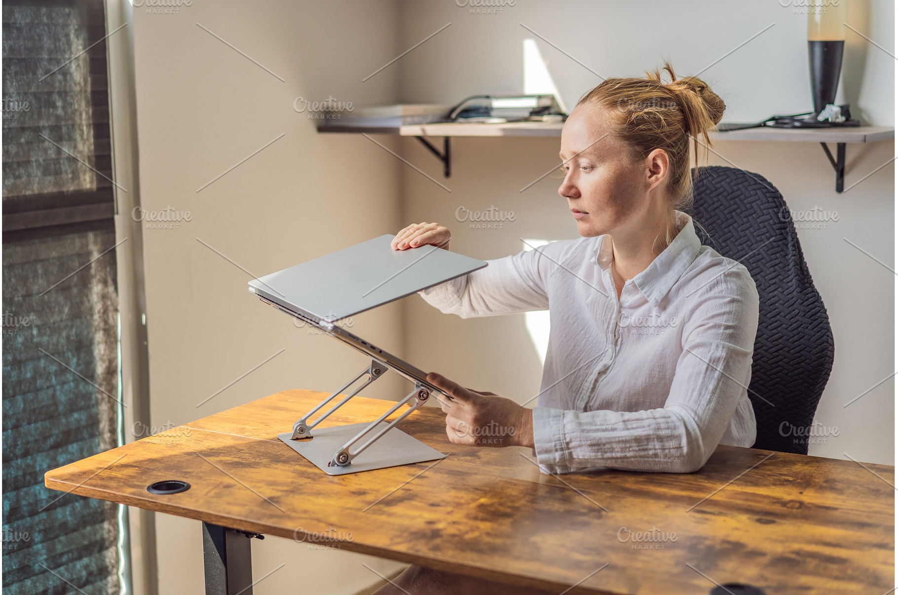 Woman working in her home office, a Person Photo by Elizaveta Galitskaya