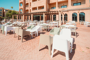 Modern terrace seating in sunlight, an Architecture Photo by SkyNext
