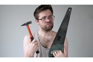 Funny young caucasian man choosing
