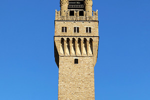 Palazzo Vecchio Tower rising majestically over Florence on a clear day, an Architecture Photo by Antonio Gravante Market