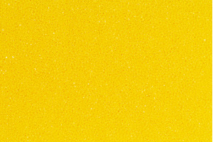 Bright yellow color foam sponge, an Industrial Photo by Alexander-Piragis
