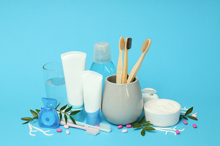 Concept of tooth or oral care on blue background, a Health & Medical Photo by AtlasStudio PRO