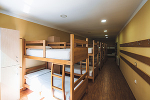 Bunk bed hostel dorm interior, an Architecture Photo by SkyNext