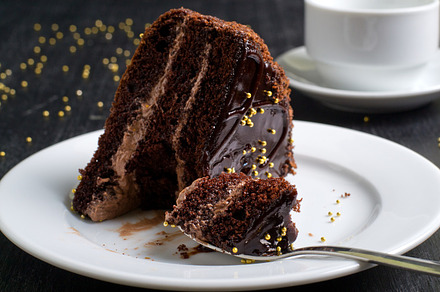 A piece chocolate cake featuring food, cake, and baked