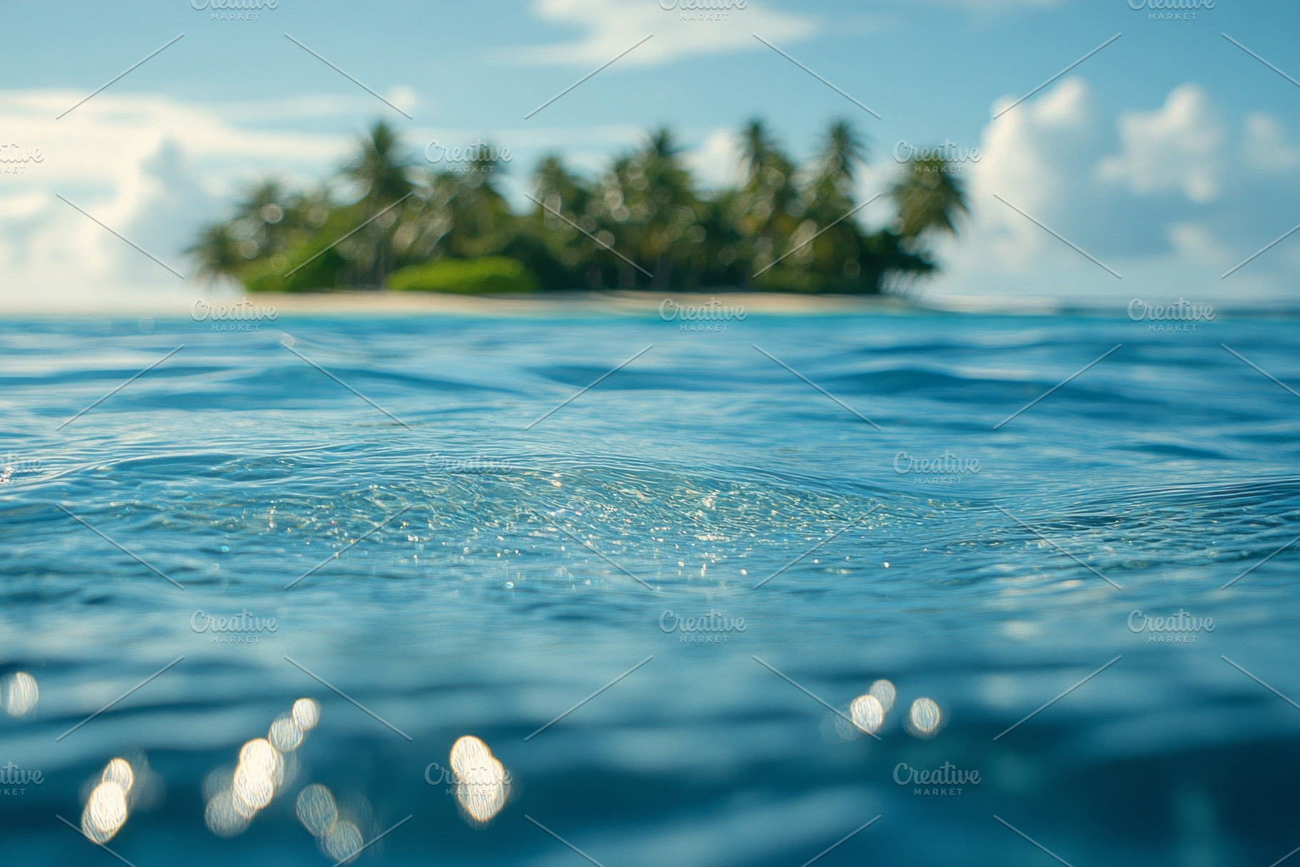 A tranquil view of sparkling ocean water with a distant tropical island in the, a Background Photo by ImageMir