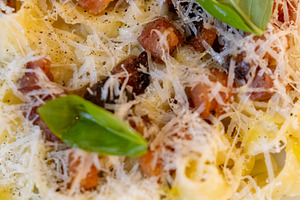 Pasta carbonara italian cuisine bacon cheese basil, a Food & Drink Photo by Photo Drive Studio