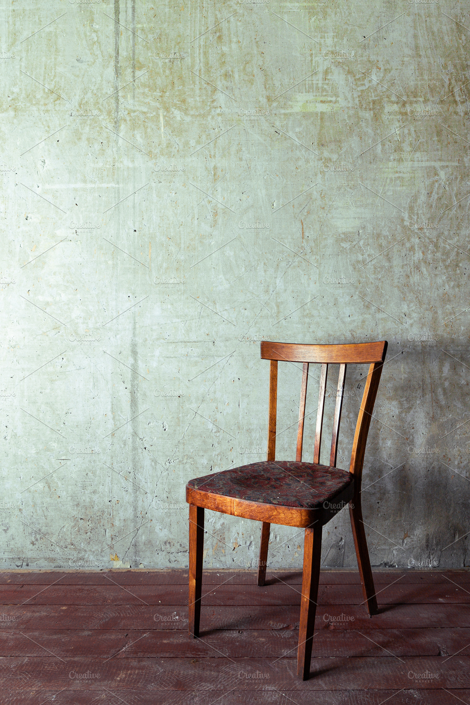 Vintage wooden chair concrete wall, an Architecture Photo by Edalin's Store