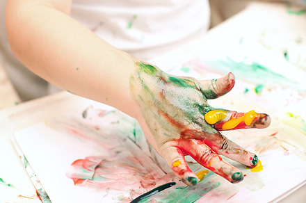 Boy painting with fingerpaints stock photo containing boy and paint, an Arts & Entertainment Photo by Grey Coast Media