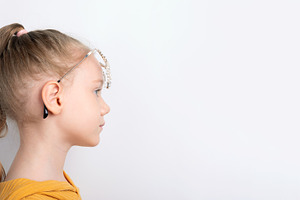 Profile of Young Girl with Headphones, a Photo by Ales Munt