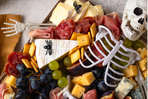 Assortment of cheese and meat, a Food & Drink Photo by Yulia Furman