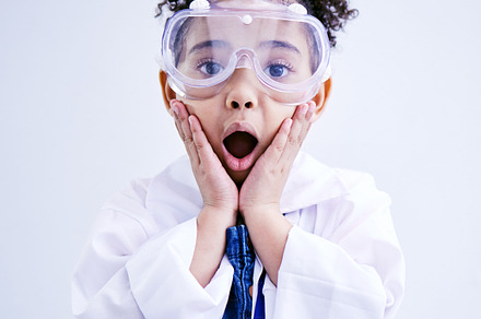 Child, shocked and science portrait with glasses in studio with open mouth, wow or surprised face. African kid student excited for education or biology experiment and learning for future scientist, a Photo by Peopleimages.com