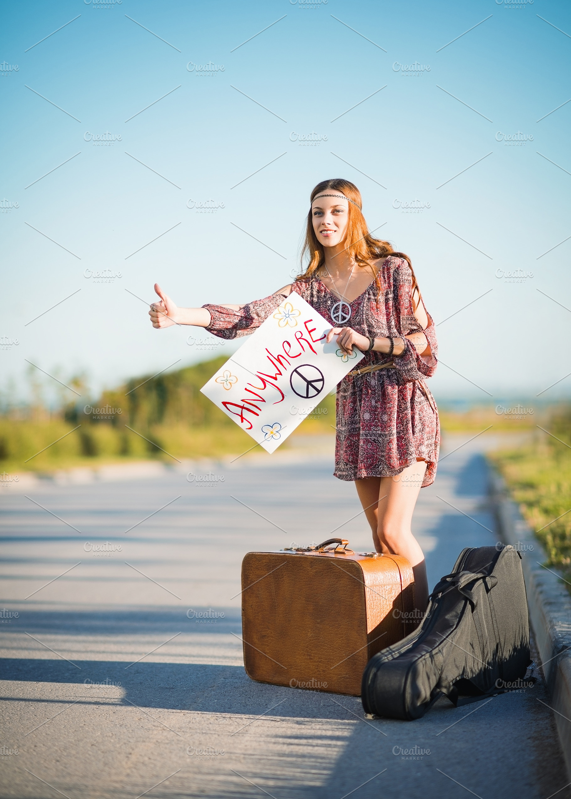 Lovely young hippie girl hitchhiking, a Person Photo by Jetrel