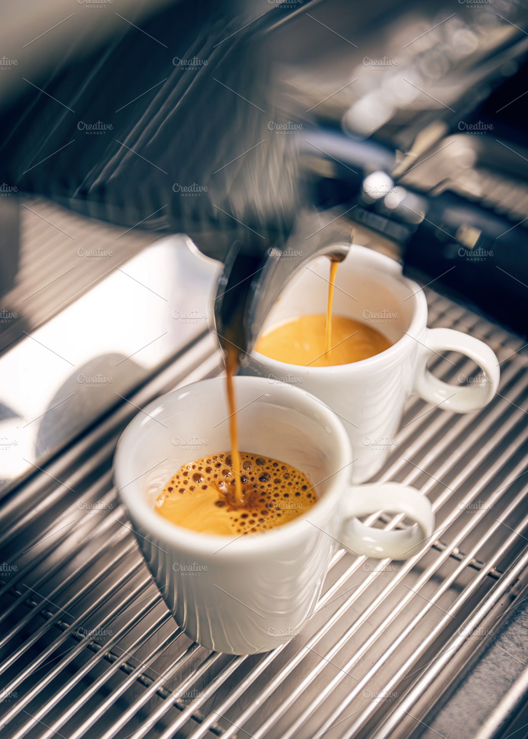 Coffee machine pouring espresso, a Photo by Grafvision photography
