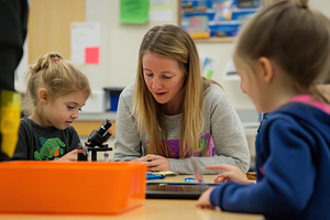 Observing science with a microscope, a Photo by Pavel_design