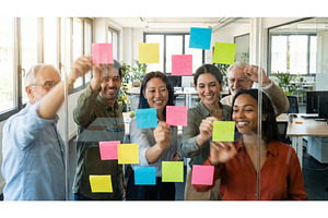 Team Uses Sticky Notes, a Person Photo by CREATIVEDEF