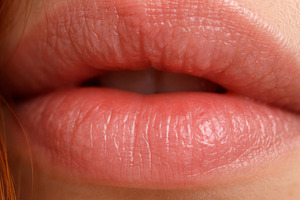 Macro close-up of female lips, detai, a Photo by Dvoevnore photos