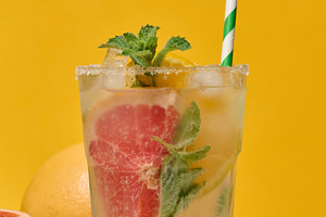 Glass with cool drink garnished with mint, lemon and grapefruit., a Food & Drink Photo by ndanko