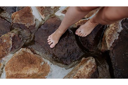 Young woman legs on stone stairs in, a Nature Photo by HalfPoint
