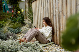 Young girl sitting on ground