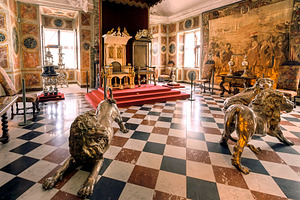 Lions statues and antique tapestries