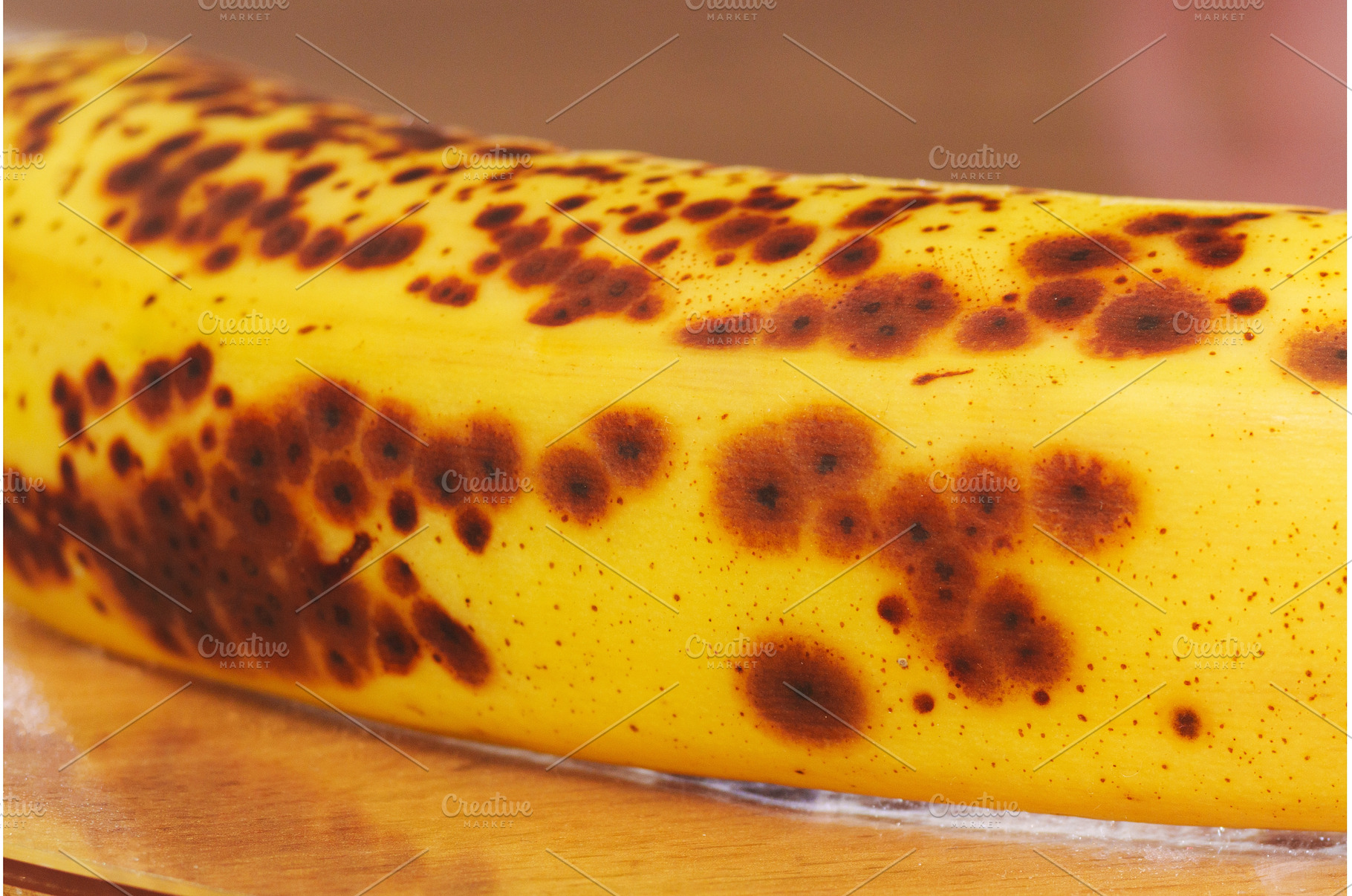 A ripe banana showcases its yellow, a Food & Drink Photo by darksoul72