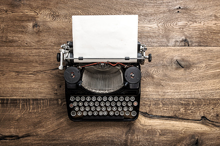 Vintage typewriter with paper containing typewriter, vintage