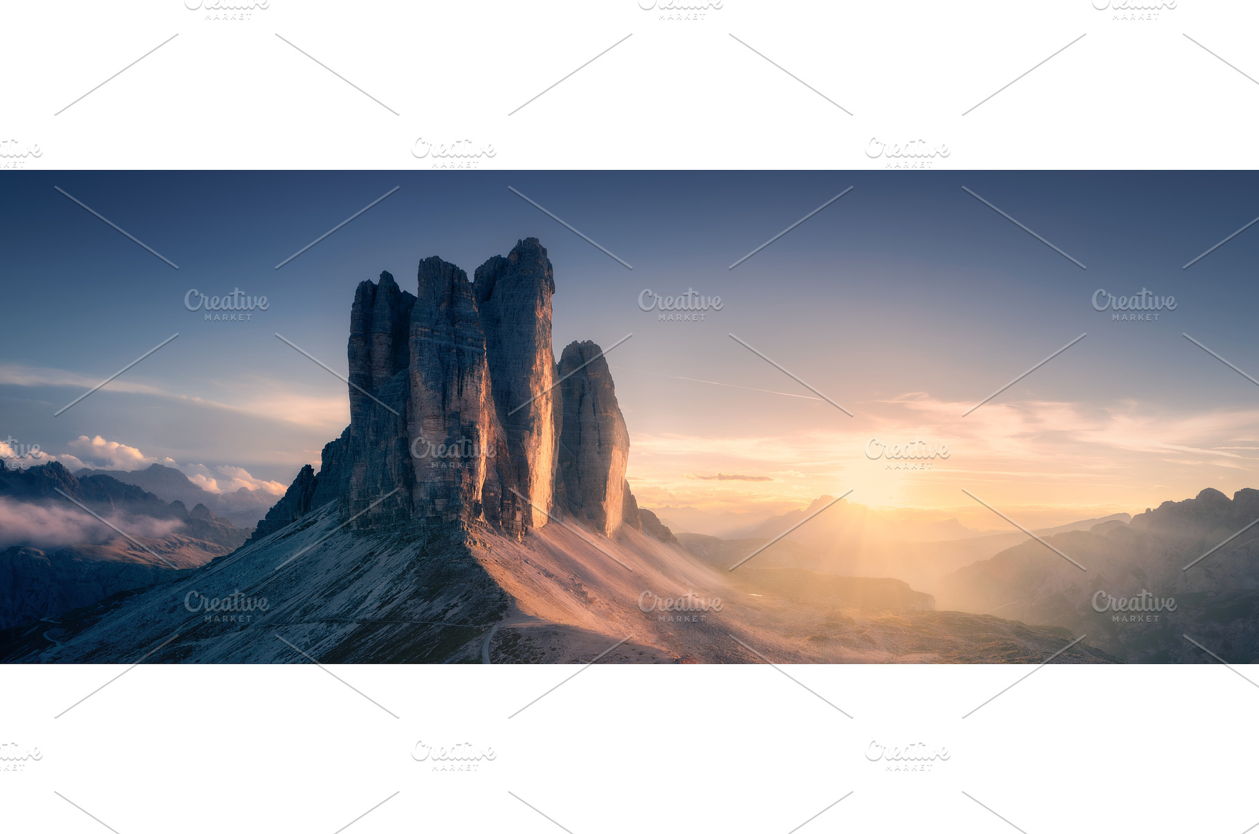 Epic rocky mountains at sunset in, a Nature Photo by den-belitsky