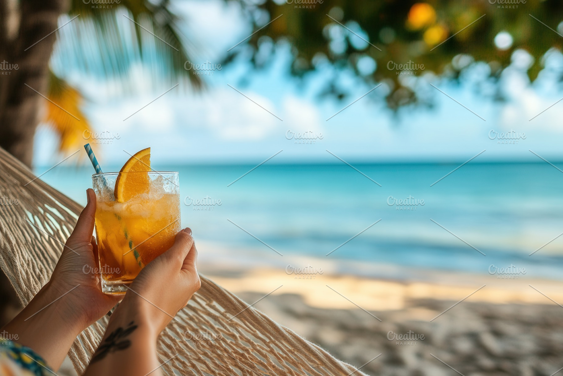 A person relaxes on a hammock, a Photo by Pavel_design