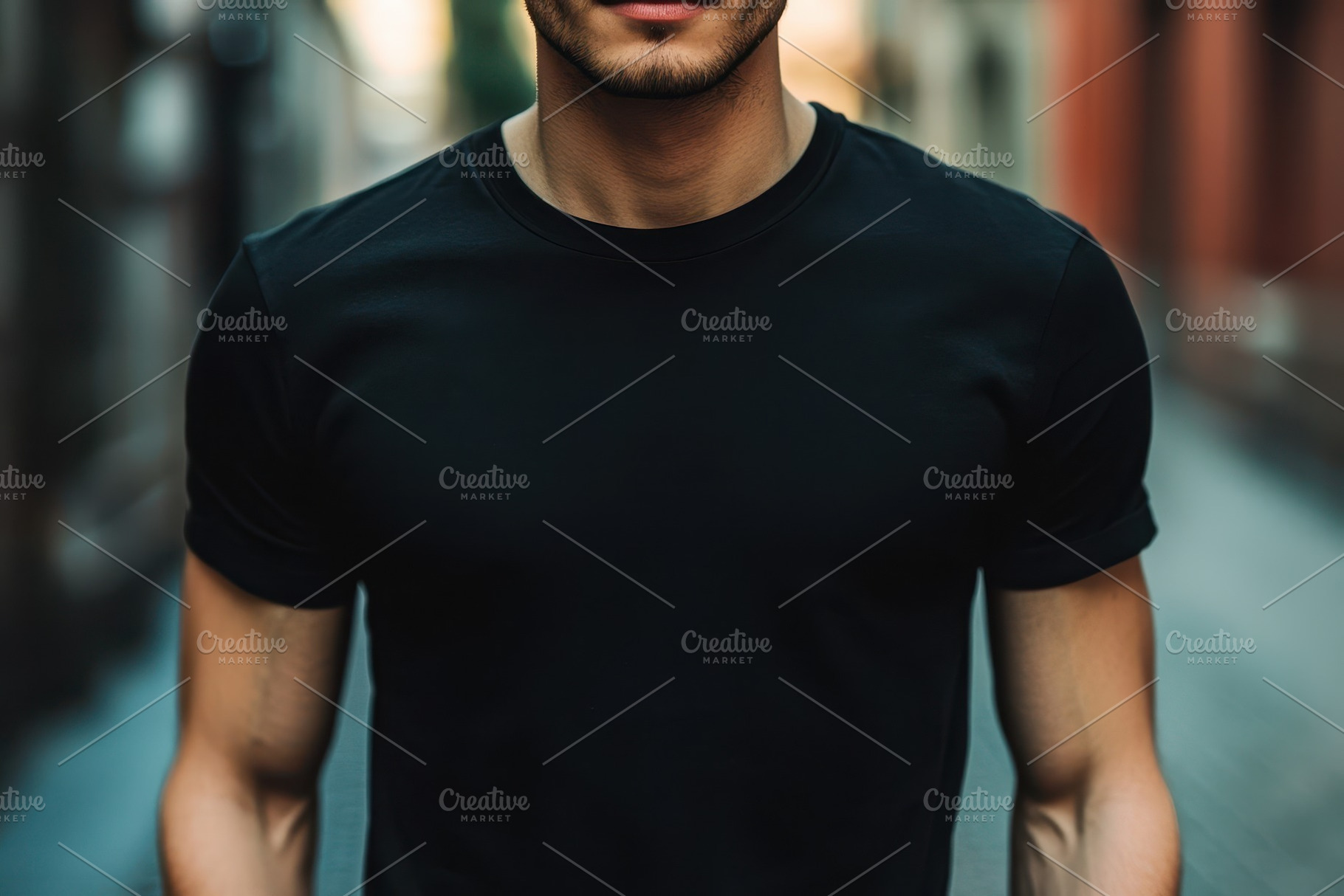 Handsome man wearing a black t-shirt, a Photo by Pavel_design