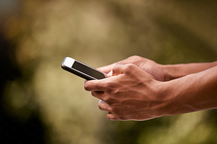 Man hands, park and typing phone on mobile app, social media and digital iot connection outdoors. Closeup smartphone internet website, social network communication and 5g cellphone technology online, a Photo by Peopleimages.com