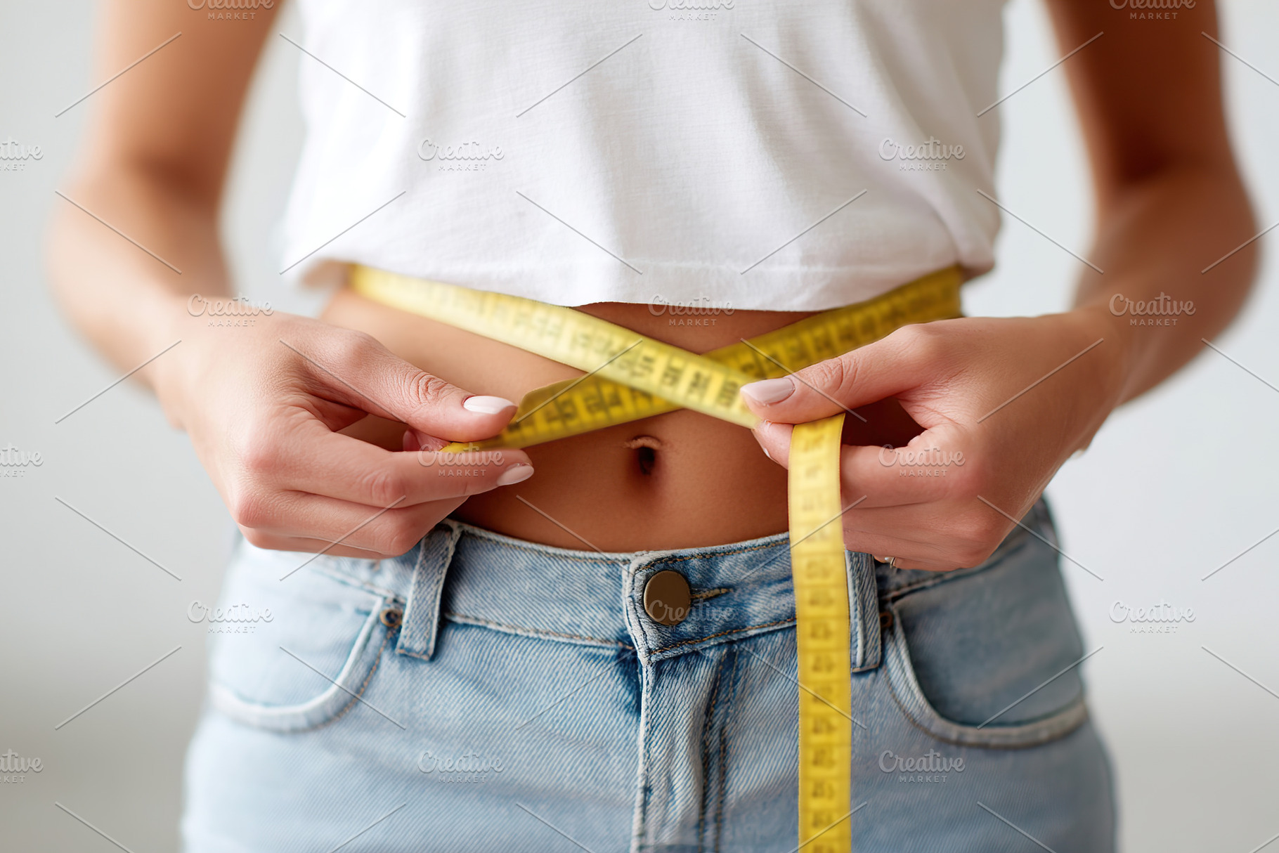Dietitians measuring waist size for nutritional assessment in a clinical settin, a Sports & Recreation Photo by AlyaAnd