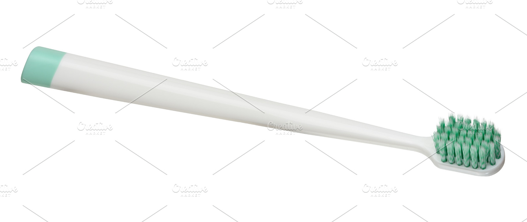White plastic toothbrush with turquoise insert on the handle and, a Health & Medical Photo by ndanko
