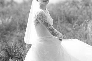 bride blonde girl with a bouquet in the forest, a Person Photo by Weddings, People, Travel