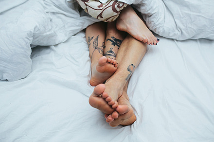 Young couple in bed together stock photo containing bed and female