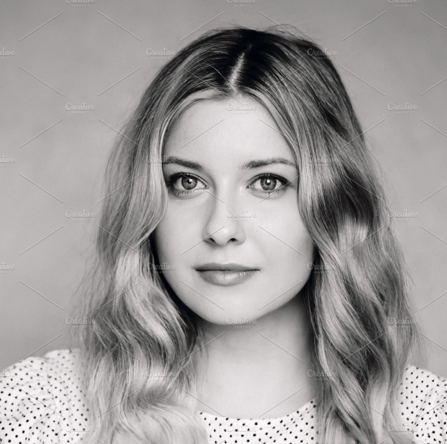 Portrait of a serene young woman with soft wavy blonde hair and, a Person Photo by Studio ANNA