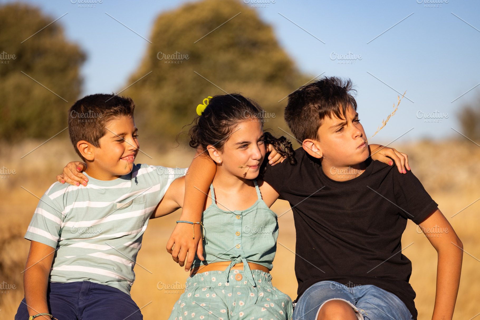 Three children enjoying their summer vacation in the countryside, a Person Photo by Cosca